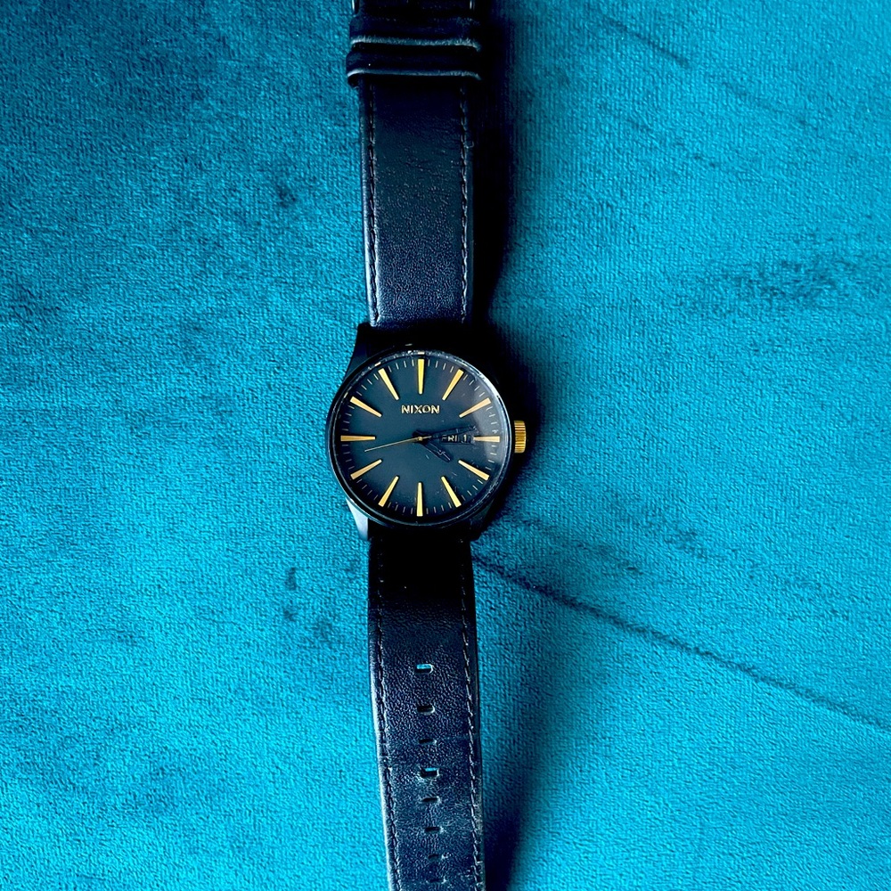 Men’s black Nixon watch